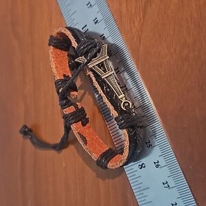 Eifel Tower charm adjustable black leather